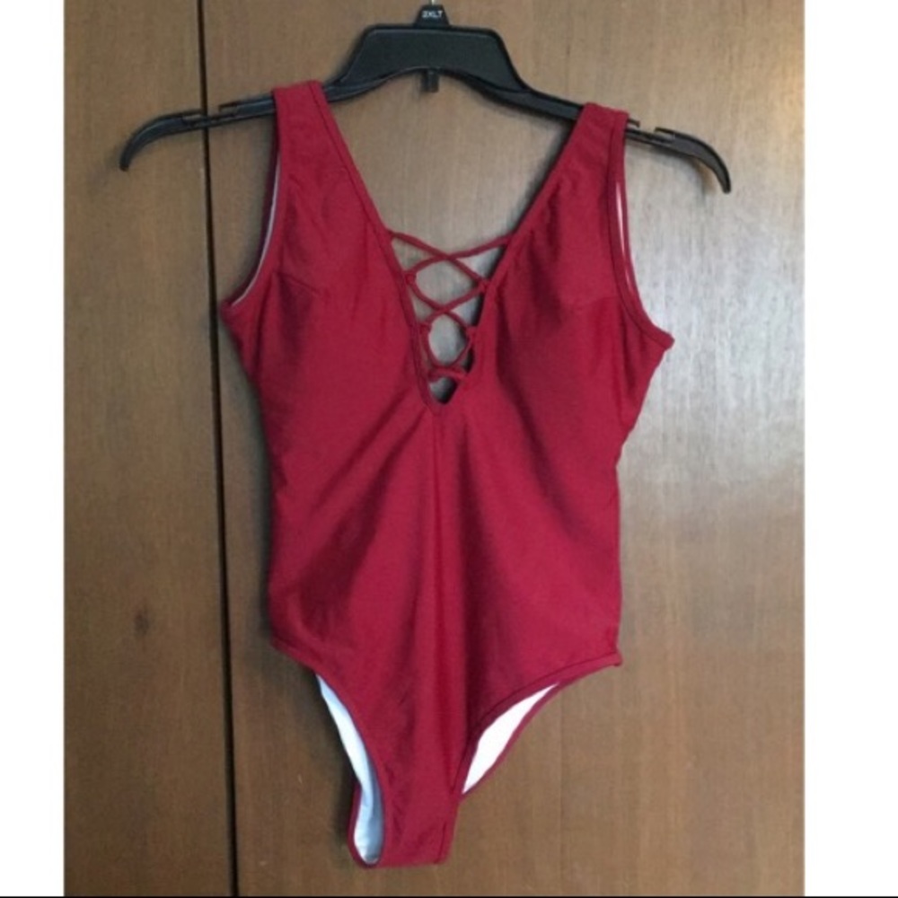 Red lace up one piece bathing suit